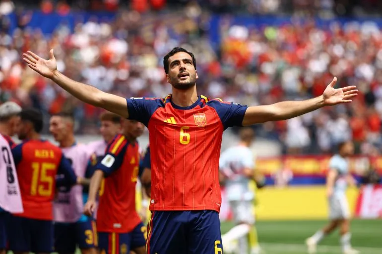 Spain's Mikel Merino celebrates scoring their second goal