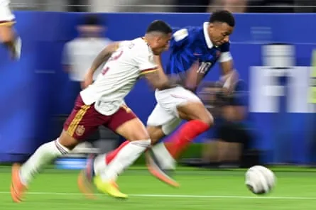 Pedro Porro keeps pace with France captain Kylian Mbappé