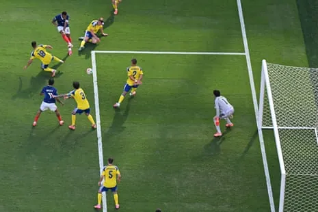 Kylian Mbappe shoots to score.