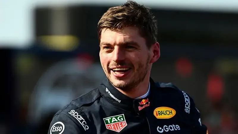 Max Verstappen in a black Red Bull racing outfit